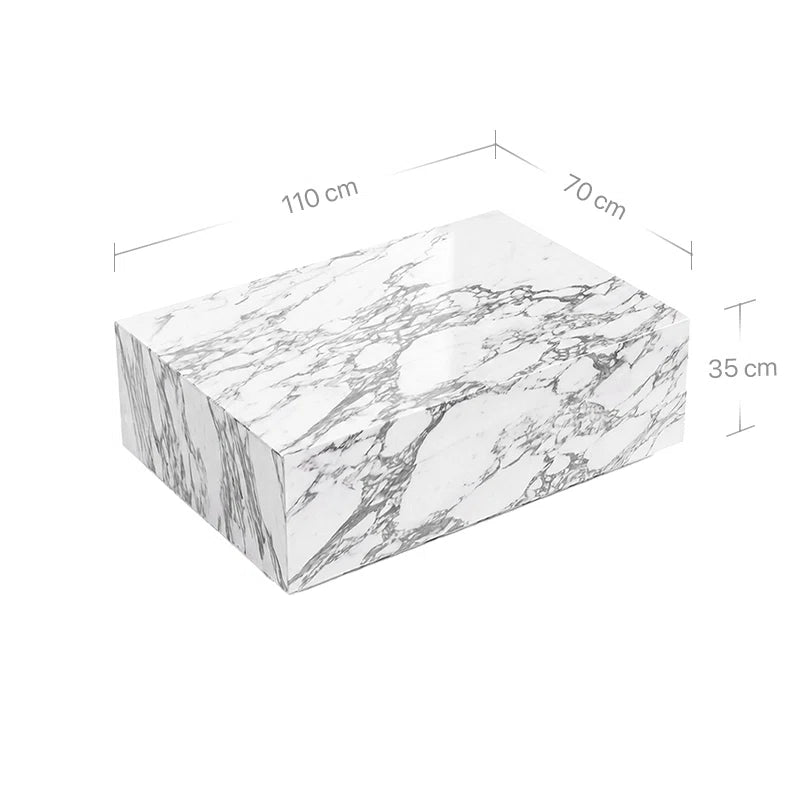 Technisches Bild mit Maßangaben für den Madena Couchtisch aus Arabescato Marmor. Die Grafik zeigt die großzügigen Dimensionen von 110 cm Länge, 70 cm Breite und eine Höhe von 35 cm für den monolithischen Marmorblock.