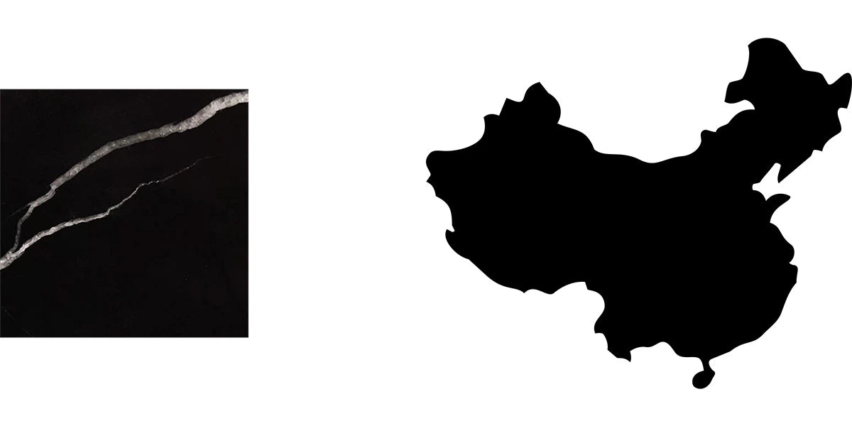 Tiefschwarzer Nero Marquina Marmor mit markanter weißer Aderung und die geografischen Umrisse von China – Menelame Kollektion.